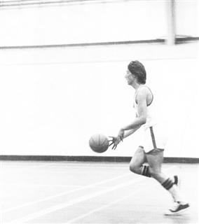 Paul Cocks brings up the back court 1970 - ish
